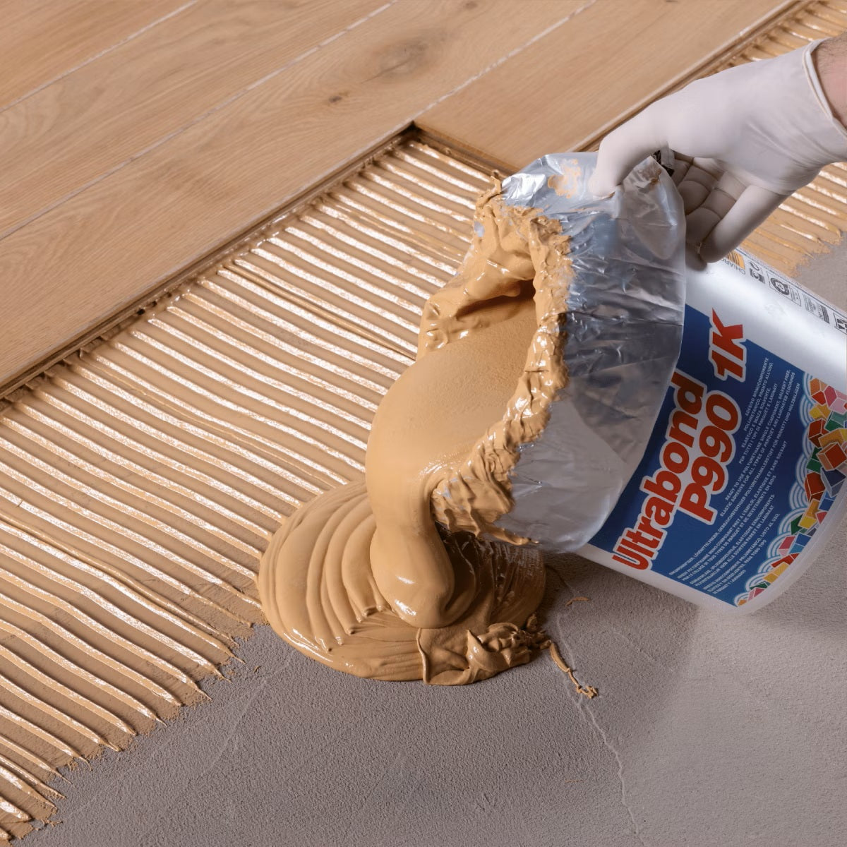MAPEI Ultrabond P990 1K jednozložkové polyuretánové lepidlo na drevené podlahy aplikácia