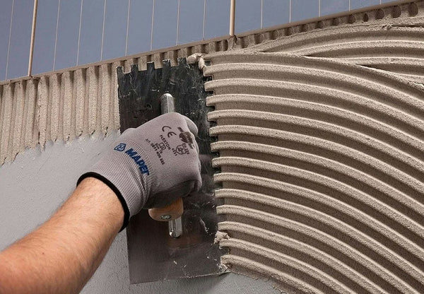 MAPEI Keraflex Extra S1 tenkovrstvé cementové lepidlo na dlažbu a obklad aplikácia